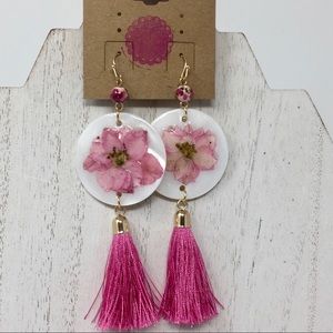 Pink enamel flower disc earrings with pink tassel